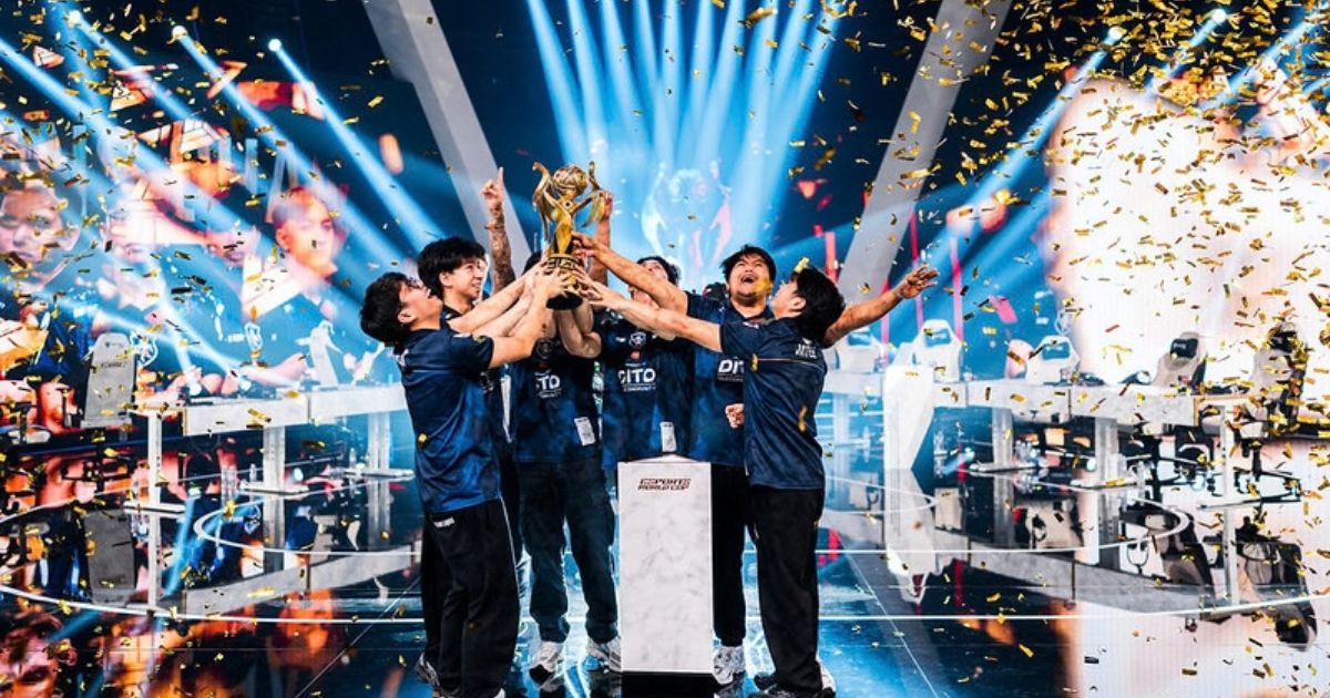 Winners at Esports World Cup 2026 celebrate with a cup and ticker tape